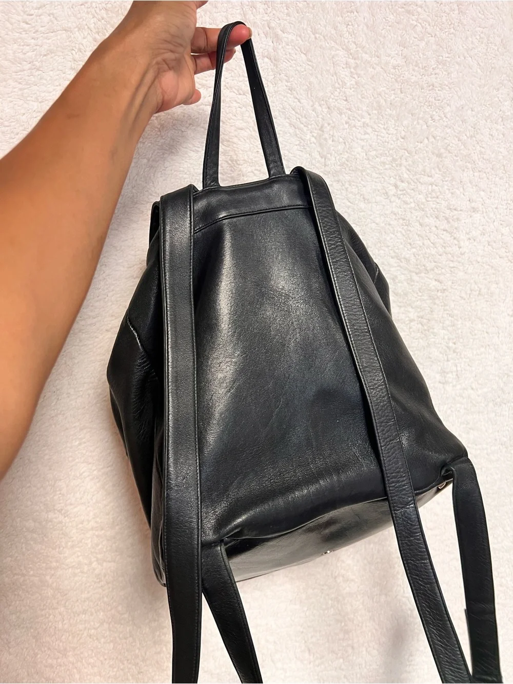 Perlina Black Leather Drawstring Flap Backpack
